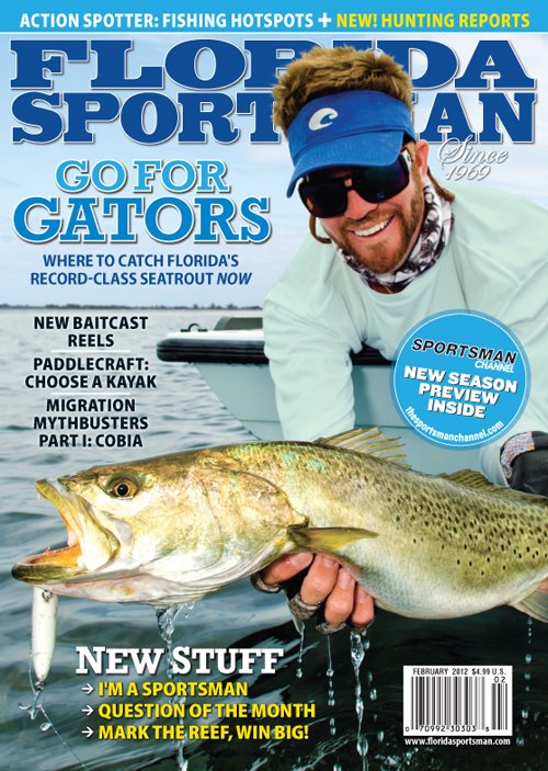 Jason Stock on the cover of Florida Sportsman Magazine holding a trout.