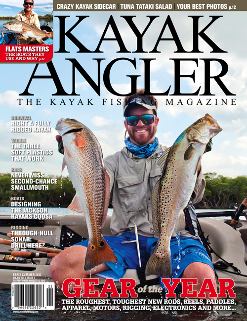 Kayak Angler Magazine Cover with Jason Stock holding a redfish and trout while sitting in a kayak.